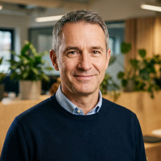 James Mitchell, listed as Chief Executive Officer at Emberton Coralvik, in a profile image